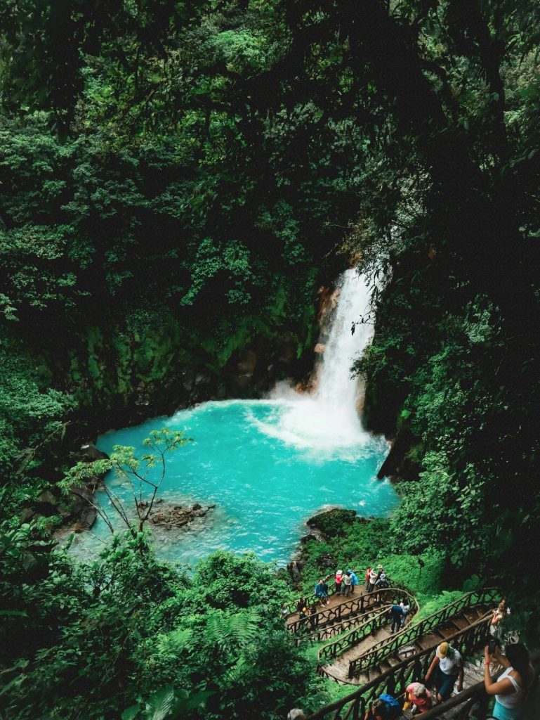 Rio Celeste Waterfall in Costa Rica with hiking path