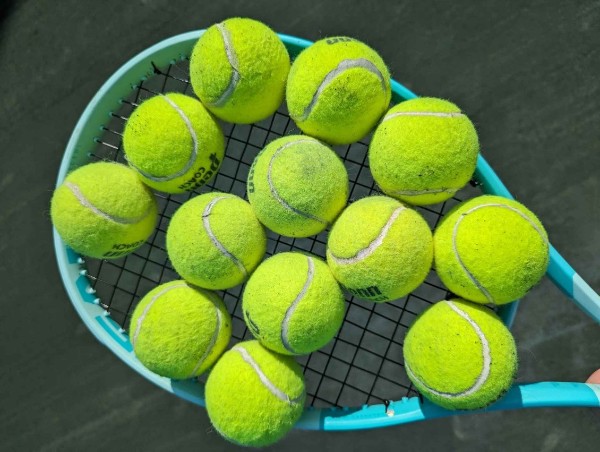 Tennis on Hilton Head Island balls and clay court